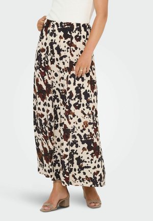 Gonna maxi con uno sfondo beige e un motivo a macchie in nero e sfumature di marrone. Presenta una vita elastica per il comfort.