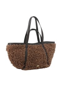 Brown textured tote bag featuring curly fur-like material, black leather accents, and two sturdy black shoulder straps.
