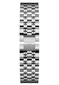 Orologio in metallo argentato con bracciale a maglie. Presenta una superficie lucida, logo incavato e chiusura liscia. Nessun quadrante o faccia visibile.