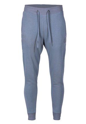 Lyseblå joggere lavet af blødt stof, med ribbet talje med snøre og tætsiddende manchetter ved anklerne, minimalistisk design.