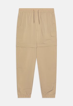 Beežid cargosid, millel on elastne vöökoht, nööride sulgemine, küljetaskud ja pahkluude juures kokku tõmmatud olemas. Sujuv, kerge kangas.