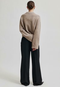 Second Female CLASSIC - Hlače - black