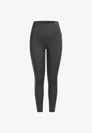Schwarze Leggings aus dehnbarem Stoff mit hohem Bund, glatter Textur und seitlichen Taschen. Das Design umfasst subtile Stichdetails.
