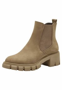 Beige suede ankle boot with elastic side panels, chunky rubber sole, and a pull tab at the back for easy wear.革长靴。