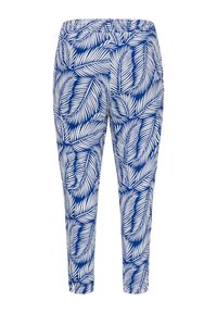 Blue and white pants featuring a tropical leaf pattern, made from stretch fabric with an elastic waistband and tapered ankle design.