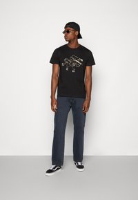 Levi's® Skateboarding SKATEBOARDING 501® - Sirgete säärtega teksad - blue