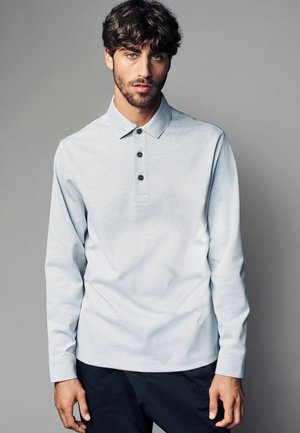- Koszulka polo