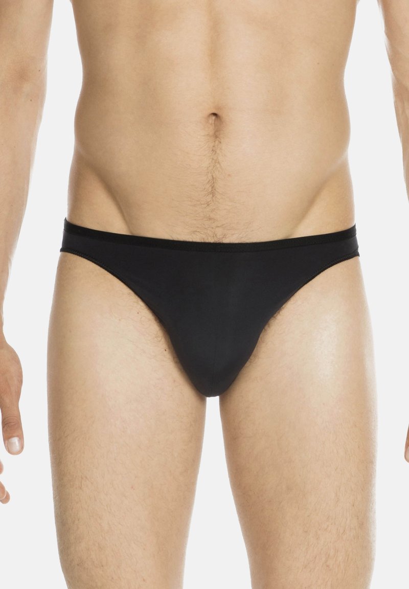 Black swim briefs made of smooth material, featuring a narrow waistband and a minimalistic design, with a snug fit around the hips.