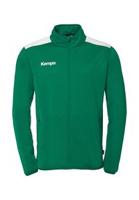 Grøn zip-up jakke med hvide skulderdetaljer, der har en høj krave og sidelommer. Materialet ser glat og let ud. "Kempa" logo foran.