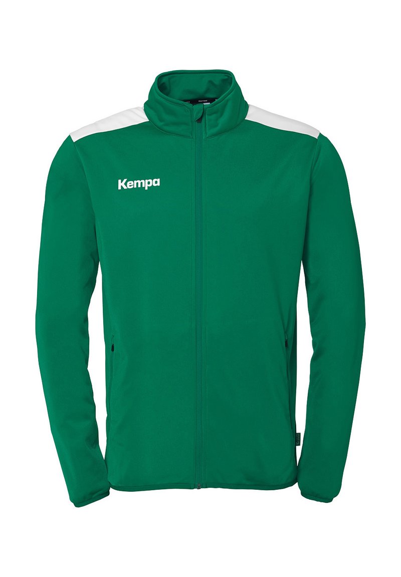 Grøn zip-up jakke med hvide skulderdetaljer, der har en høj krave og sidelommer. Materialet ser glat og let ud. "Kempa" logo foran.
