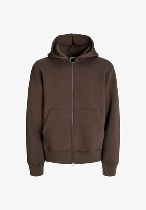 Brązowa bluza z kapturem zapinana na zamek, wykonana z miękkiego materiału. Posiada kaptur, dwie przednie kieszenie oraz ściągacze przy rękawach. Zamek błyskawiczny biegnie od szyi do dolnej krawędzi.