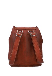 Brown leather backpack with adjustable straps and silver buckle hardware, shown from the back on a white background.