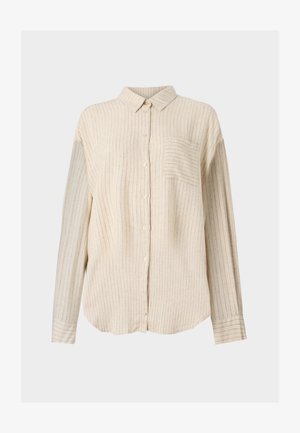 Knapplang skjorte i off-white stoff med tynne vertikale striper. Har krage, lange ermer og en frontlomme. Myk tekstur.