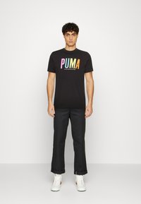 Puma GRAPHIC - Triko s potiskem - black