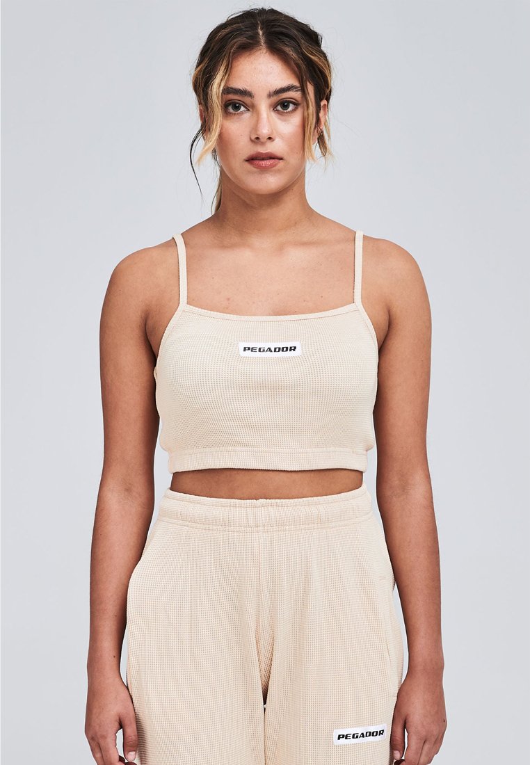 Pegador Top beige Pegador Top beige