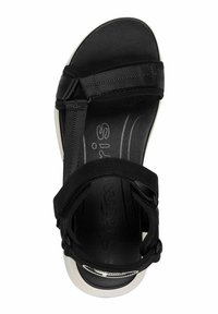 Černé sandály s texturovanou stélkou, nastavitelnymi popruhy a bílou gumovou podrážkou. Navrženy pro pohodlí s otevřenou špičkou.