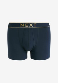 Námorníckomodré boxerky vyrobené z elastického bavlneného materiálu. Majú zlaté logo 'NEXT' na elastickom páse a ponúkajú pohodlný strih s jemnou textúrou.