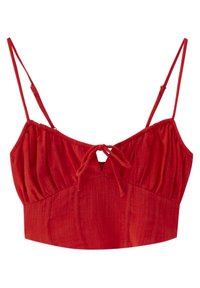 Red cropped top made of textured fabric, featuring thin straps, a keyhole detail at the center, and gathered fabric around the bust.