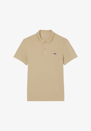 Khaki polo w kolorze khaki, wykonany z miękkiej tkaniny, z klasycznym kołnierzykiem, krótkimi rękawami oraz granatowym logo na lewej piersi.