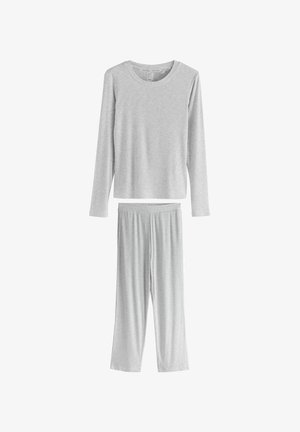 Lys grå langærmet top og matchende bukser med elastisk talje, lavet af blød, ribbet stof, vist fladt på en hvid baggrund.