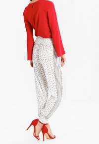 Cream Tygbyxor - off-white