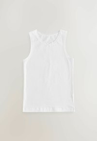Witte katoenen tanktop met een ronde halslijn, voorzien van een gekartelde rand en een klein strikje in het midden. Eenvoudig en mouwloos ontwerp.