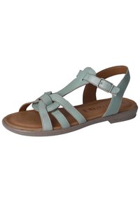 Světle zelené kožené sandály s křížovými pásky, zapínáním na sponu a polstrovanou hnědou stélkou. Plitká podrážka s mírnou strukturou.