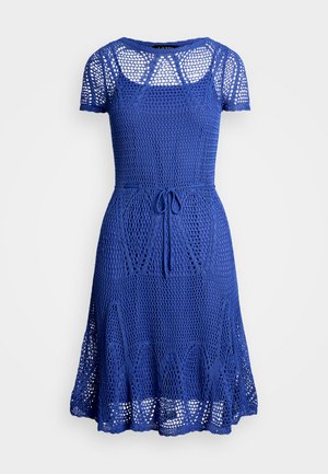 Blue, knitted dress with short sleeves, a square neckline, and a drawstring waist. Features a flared hem with a decorative pattern.