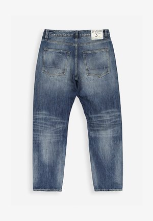 Hellblaue Jeans aus Denim mit entspannter Passform, ausgestattet mit zwei Gesäßtaschen und ausgewaschenen Bereichen für einen lässigen Look. Etikett am Bund sichtbar.