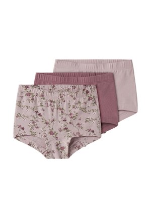 Trois culottes en coton pour femmes dans des nuances de mauve, dont une avec un petit motif floral et deux unies.