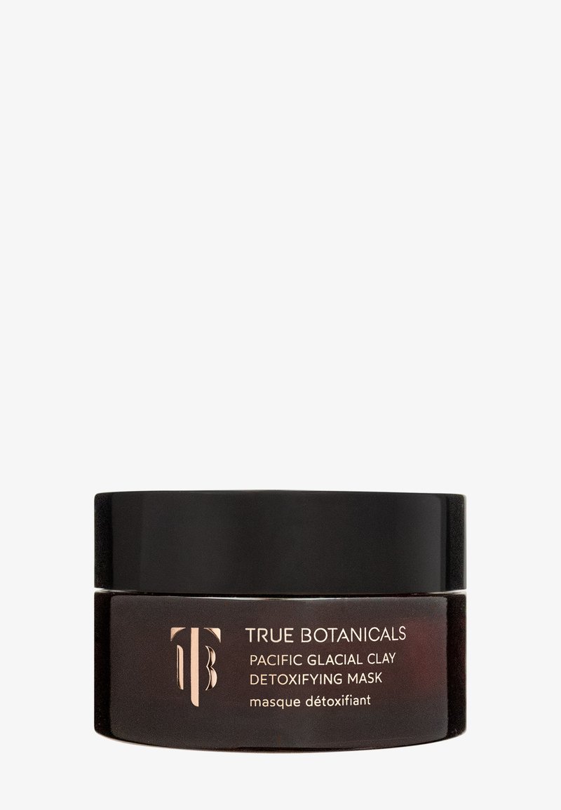 True Botanicals Pacific Glacial Clay Detox-Maske in einem schwarzen Glas mit goldener und weißer Schrift auf weißem Hintergrund.