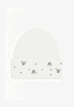 Cappello a cuffia bianco in maglia a costine con orlo ripiegato, decorato con piccole e medie decorazioni floreali argentate sparse.