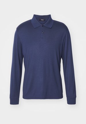 Námořnické polo tričko s dlouhým rukávem vyrobené z měkkého materiálu, s klasickým límečkem, zapínáním na tři knoflíky a žebrovanými manžetami.