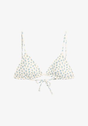 Top de bikini blanco con tirantes delgados y patrón floral azul, con cierre frontal de lazo.