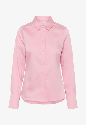 Light pink long-sleeve button-up blouse with pointed collar and cuffs, featuring a smooth fabric and a slightly curved hem.
