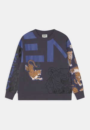 Mørkeblå sweatshirt med store grafiske bogstaver, springende leoparder og tigerillustrationer; blødt stof med ribkanter ved ærmer og kant.