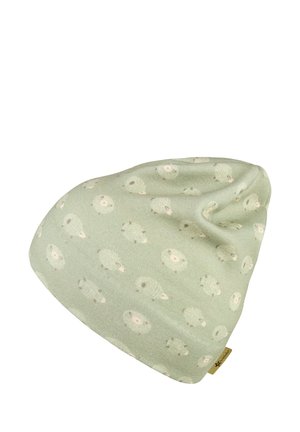Hellgrüner Beanie mit einem Muster aus kleinen weißen und beigen Schafen, die über den Stoff verstreut sind.