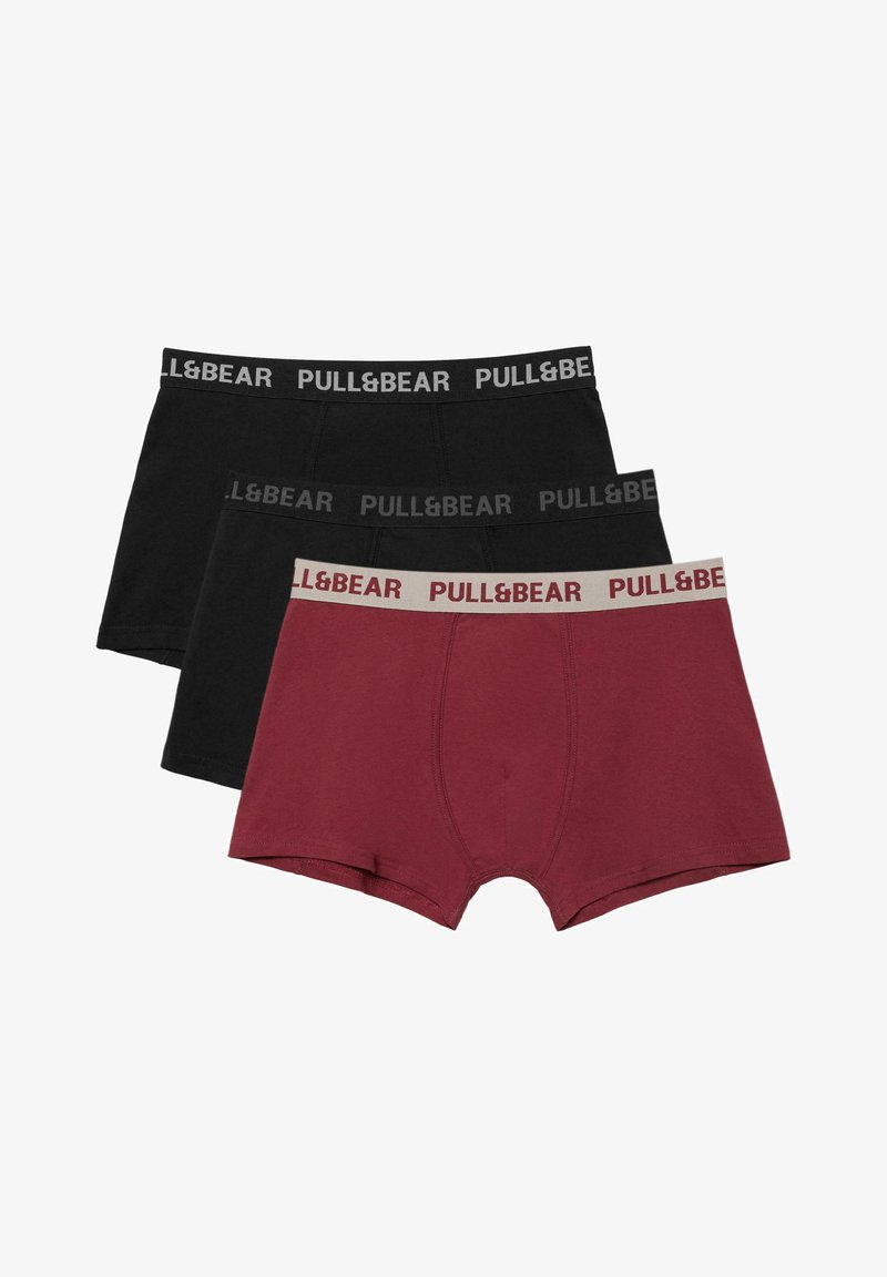 Three men's boxer briefs in black and burgundy, each with a branded elastic waistband reading "PULL&BEAR."