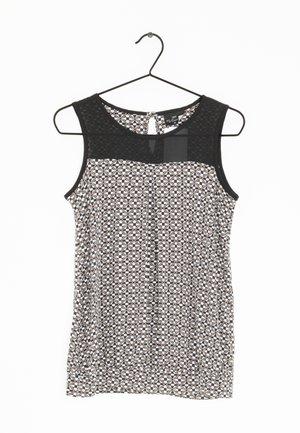 Ärmelloses Oberteil mit einem gemusterten Körper in Schwarz und Weiß sowie einem schwarzen Netzpaneel am Ausschnitt. Mit Knopfverschluss am Rücken.
