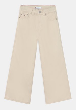 Beige Hosen mit weitem Bein aus Baumwolle, mit Reißverschluss, Knopfverschluss, Vordertaschen und dezenten Steppnähten.