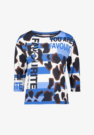 Koszula z długim rękawem w niebiesko-białe paski, nieregularne brązowe i czarne plamy oraz napis „YOU ARE MY FAVOURITE” na przodzie.