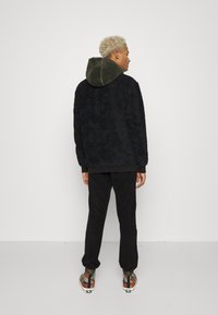 Denim Project PANTS - Calças de fato de treino - black