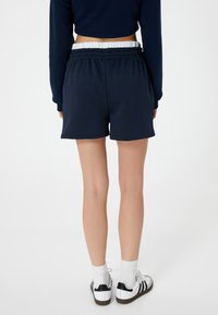 Koton Verryttelyhousut - dark blue