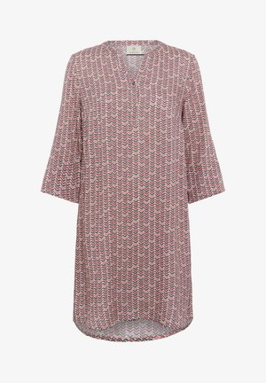 Nyomott tunika felső, V-nyakkivágással és gombos részletekkel. Piros, tengerészkék és fehér zig-zag mintázat jellemzi. Könnyű anyag; háromnegyedes ujj.