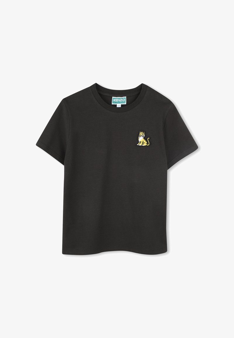 T-shirt en coton noir à manches courtes, avec un logo de tigre brodé jaune et blanc sur le côté gauche de la poitrine. Encolure ronde classique.