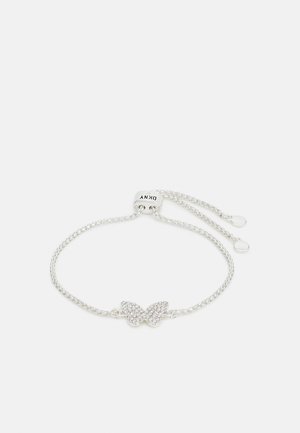 Silver bracelet featuring a butterfly design with rhinestones, adjustable chain with a sliding clasp, and smooth, shiny texture.