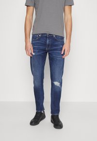 Calvin Klein Jeans Calças de ganga de corte afunilado - denim dark
