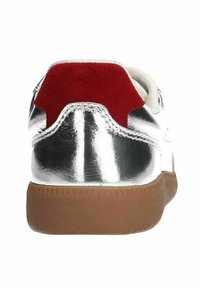 Silver sneaker with a smooth metallic upper, red suede heel accent, and brown rubber sole. Features a low-top design and flat laces.