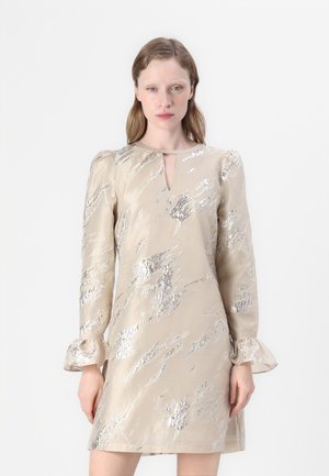 Beige knee-length dress with metallic silver abstract patterns, long puff sleeves, and a keyhole neckline detail. Smooth fabric texture.