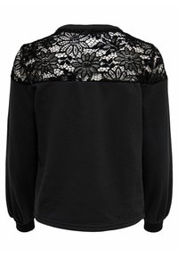 Haut noir à manches longues avec empiècement en dentelle fleurie sur le haut du dos et les épaules, tissu uni sur le bas du dos et les manches.